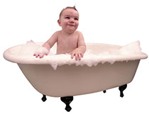This is a photo of a baby in a bathtub. 